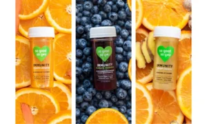 Image of Juice Shots on fruit background