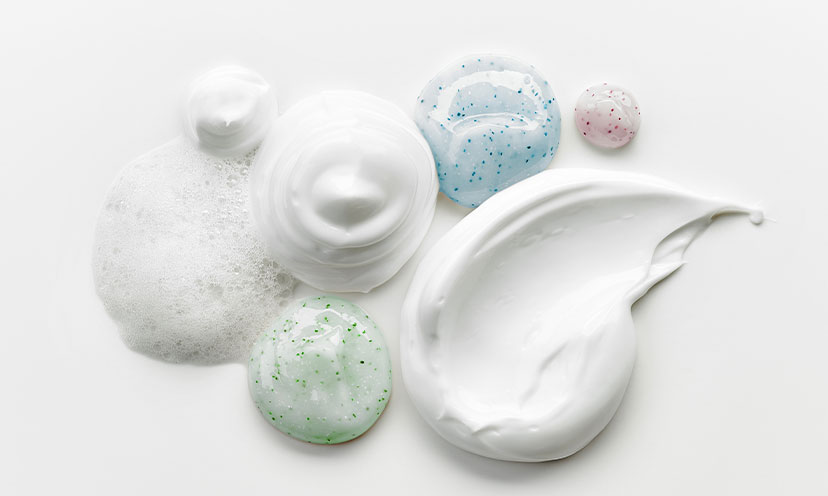 Skincare products on a white surface- various gels and creams