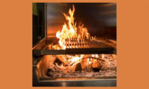 A wood grill with flames