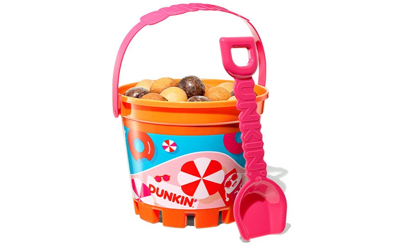 Summer bucket with Munchkins donut holes in it